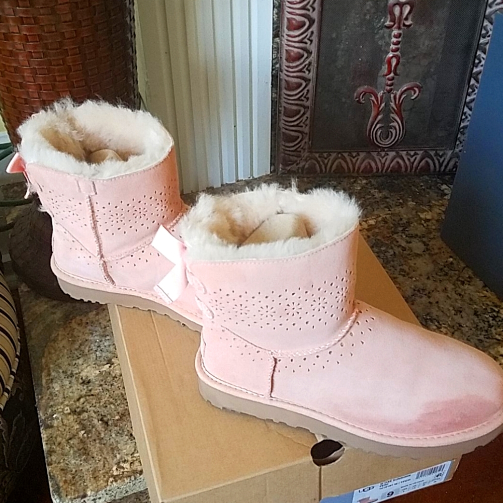 Pink Ugg bowtie boots